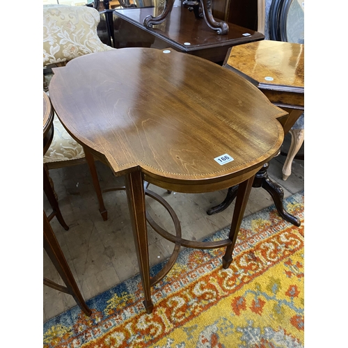 166 - An Edwardian mahogany occasional table