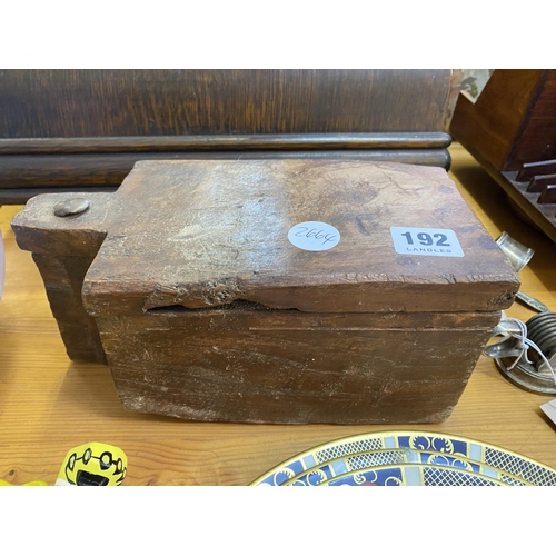 192 - An Eastern wooden box with a swivelling lid