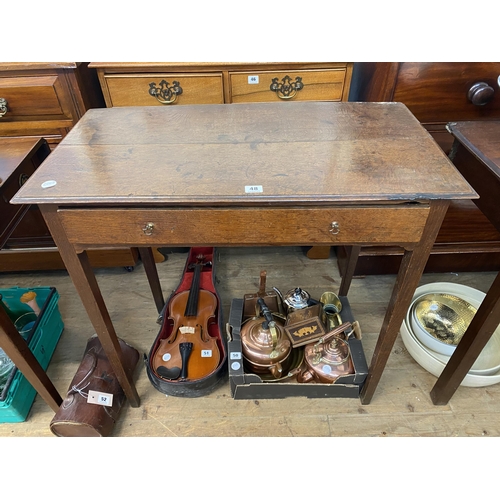 48 - An oak occasional table with a single drawer