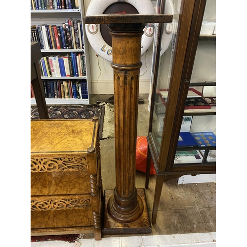 379 - A fluted pine plant stand in the form of a classical column