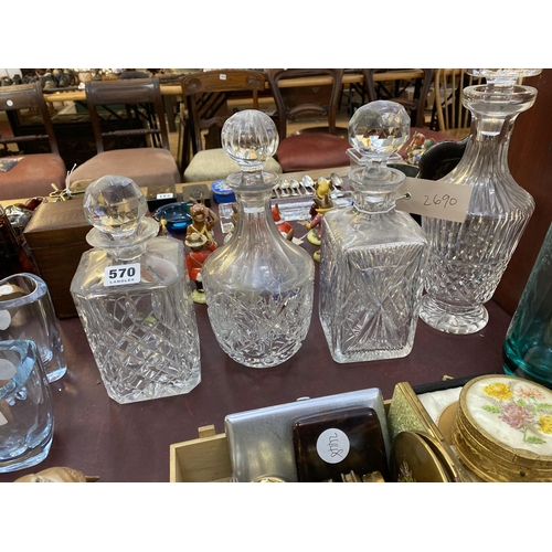 570 - 4 cut glass decanters