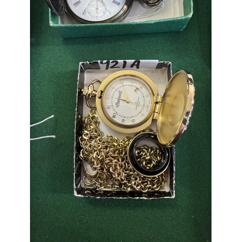 921a - An Ingersoll pocket watch, 9ct gold chain, 2 other chains and a toggle