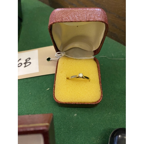 936b - A solitaire diamond and gold ring