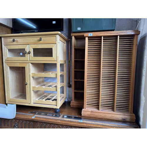 3 - A CD rack, pine shelves and a kitchen storage trolley