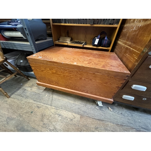 49 - A pine tool chest with fitted trays