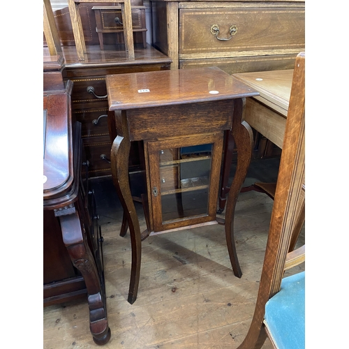 114 - An oak pipe cabinet