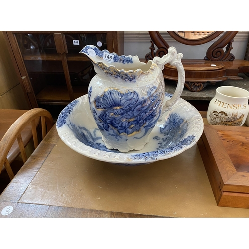 146 - A decorative water jug and bowl