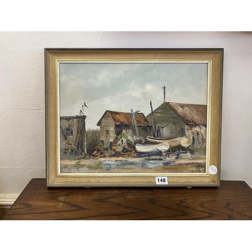 148 - A framed oil painting of fisherman's sheds at Orford by Doreen Allan