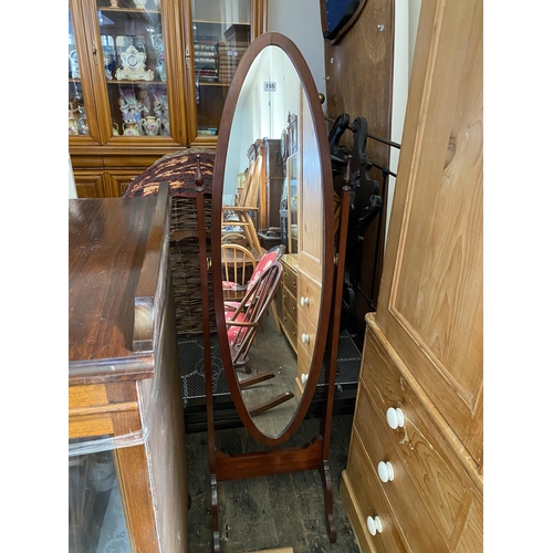 155 - A mahogany framed oval cheval mirror