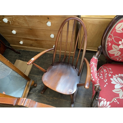 155a - An Ercol spindle backed rocking chair