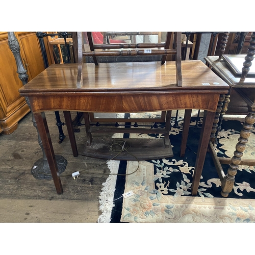 168 - A mahogany foldover side table