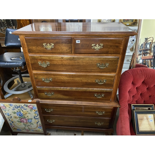 199 - A good quality mahogany reproduction chest on chest of small proportions with 7 drawers, brass swan ... 