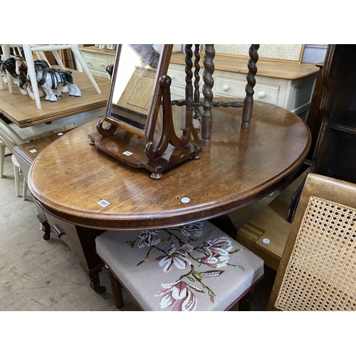 207 - A Victorian oval breakfast table on a tapering octagonal pedestal