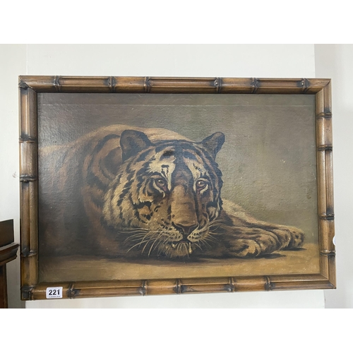 221 - An oil on canvas of a Bengal tiger within a bamboo style frame