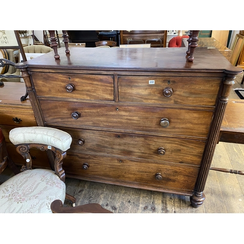 242 - A large Victorian mahogany chest of 3 + 2 graduated drawers, the front corners with tapering reeded ... 