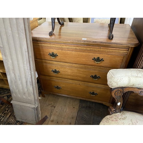 247 - A mahogany chest of 3 graduated drawers with a brushing slide