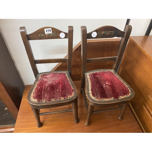 279 - A pair of miniature chairs