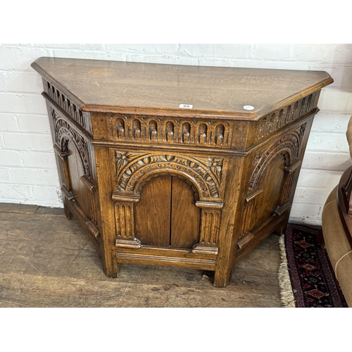 55 - An oak trunk with arched detail to the panels