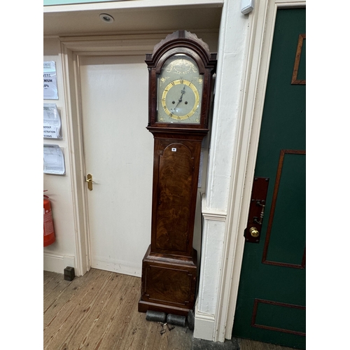 65 - A walnut long cased clock, the painted dial decorated with anchors and foliate swags - Paxton of St ... 