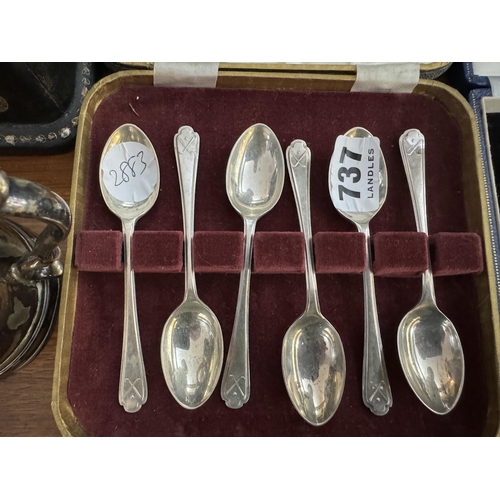 737 - A boxed set of 6 silver teaspoons