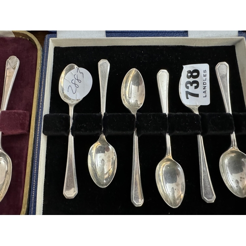 738 - A boxed set of 6 silver coffee spoons