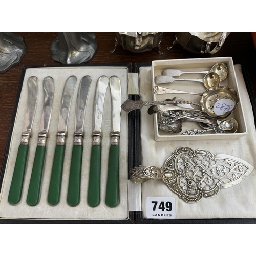 749 - Boxed tea knives and assorted silver and white metal spoons, decorative Continental slice etc