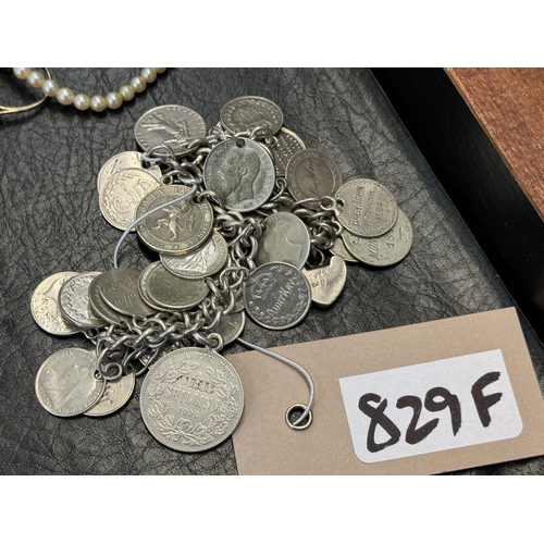 829f - A silver coin bracelet