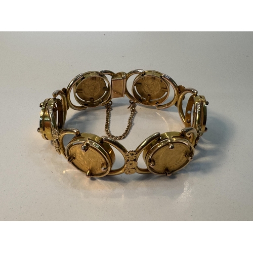 851 - A yellow metal bracelet set with 6 x 1945 dos pesos Mexican gold coins