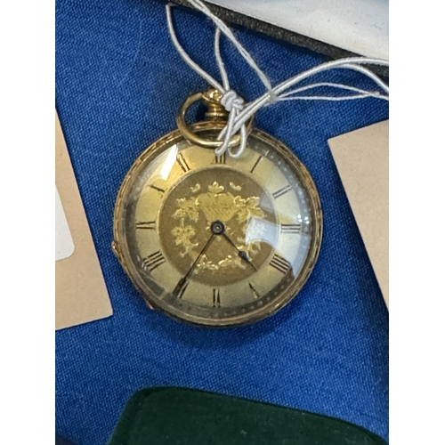 865 - A ladies 18ct gold pocket watch, the rear and the sides with chased decoration, a gold face with Rom... 