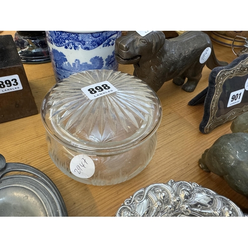 898 - A cut glass powder jar with a silver rim to the lid