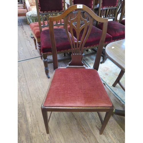 63 - A set of six George III style shield back mahogany dining chairs, with pierced vase shape splats, dr... 