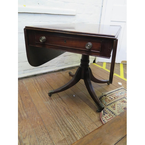 66 - A Regency mahogany Pembroke table, the rectangular top with drop leaves over a single frieze drawer ... 