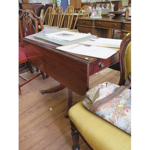 66 - A Regency mahogany Pembroke table, the rectangular top with drop leaves over a single frieze drawer ... 