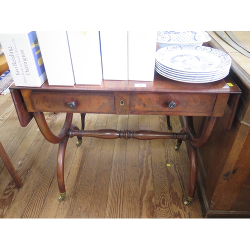 68 - A 19th century continental style sofa table, with two frieze drawers on X-frame supports, joined by ... 