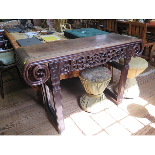 72 - A Chinese hardwood altar or side table, possibly Huang Huali, the top with curved ends above a squar... 