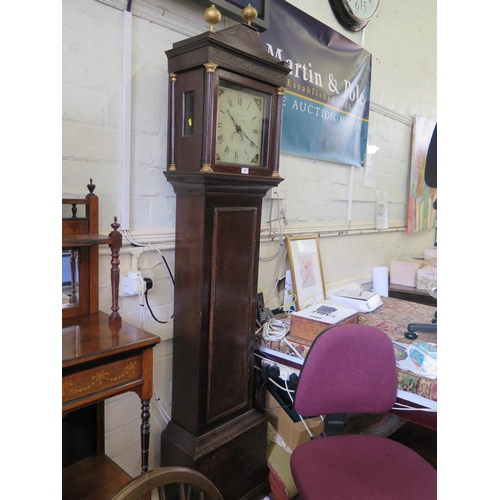 92 - An early 19th century oak longcase clock, with gilded finials over blind fret carved frieze, the she... 