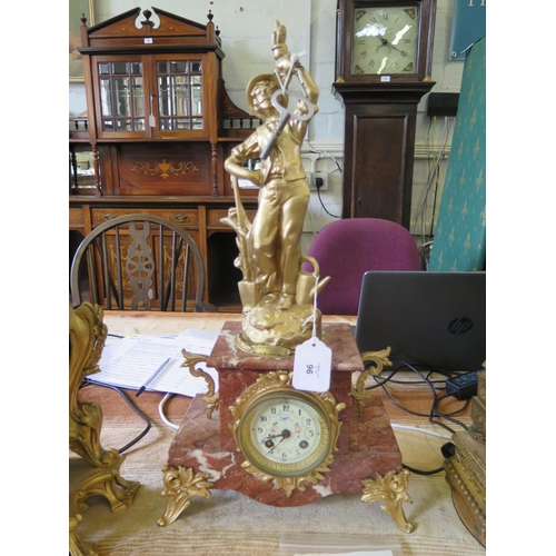 96 - A late Victorian gilt spelter and pink marble mantel clock, the figure of a gardener (after Ruchot) ... 