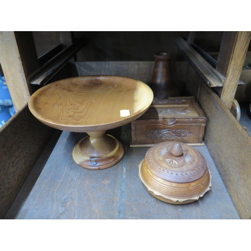 294 - Four various treen items including a cake stand, trinket bowl and puzzle box