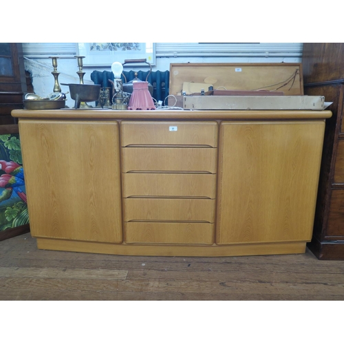 23 - A Skovby light oak sideboard, the five central drawers flanked by cupboard doors, 164 cm wide, 49 cm... 