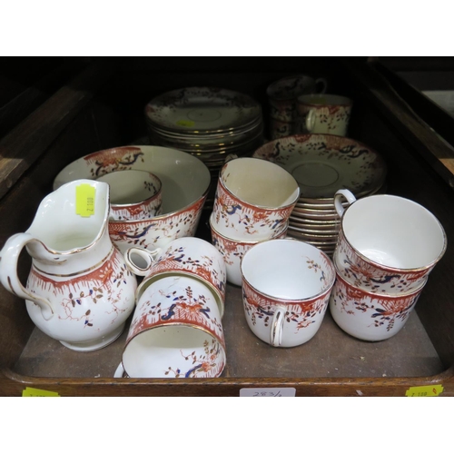 283 - An Edwardian red printed part tea service, with blue foliate design, and a Royal Osborne pink rose d... 