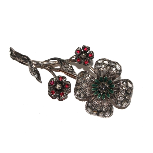 517 - A mid 19th century brooch in the form of a large flower with three heads, the large head set with a ... 