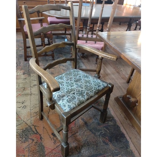 4 - An Oak Refectory-style table by Webber of Croydon, including 6 dining ladder-back chairs of which tw... 