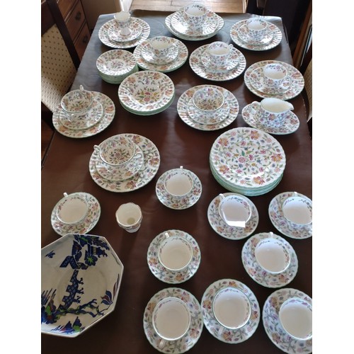 403 - A Minton Haddon Hall pattern service comprising dinner plates, bowls, side plates, jug and cups and ... 