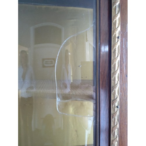 22 - A large French Vitrine with mustard colour interior, painted panels and glass panelled doors. (One g... 