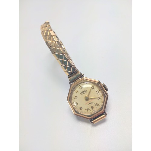 293 - A 9ct gold lady's dress watch. 8 grams (all in)