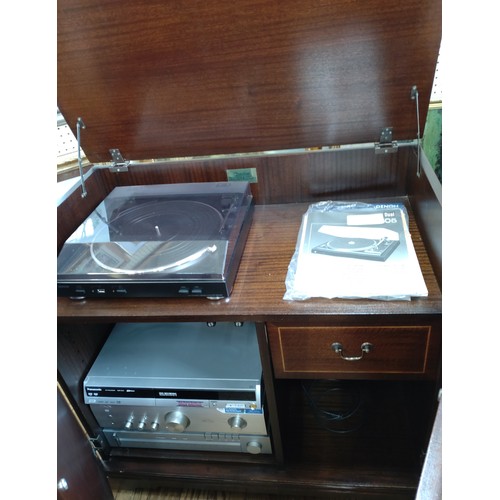 44 - A stereo cabinet with a Denon turntable and amp, and  a Panasonic DVD player