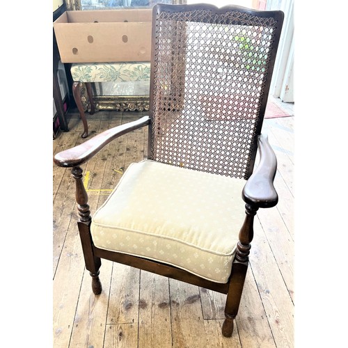 547 - A Rattan back chair. circa 1920.