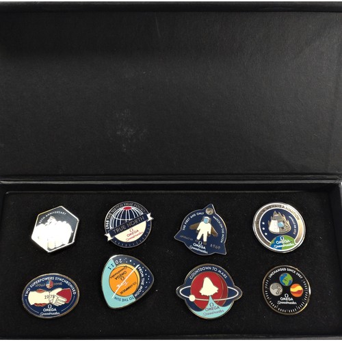 1048 - Omega Speedmaster 50th anniversary boxed commenorative set of eight enamel pins. 1957-2007 limited e... 