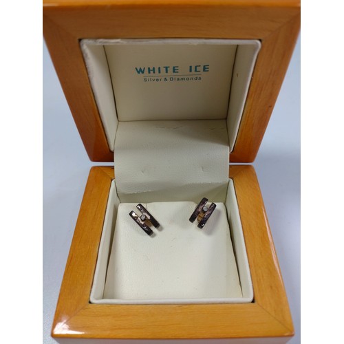 1047 - A Hot Diamond necklace and pendant in a box, together with a pair of white ice earrings.