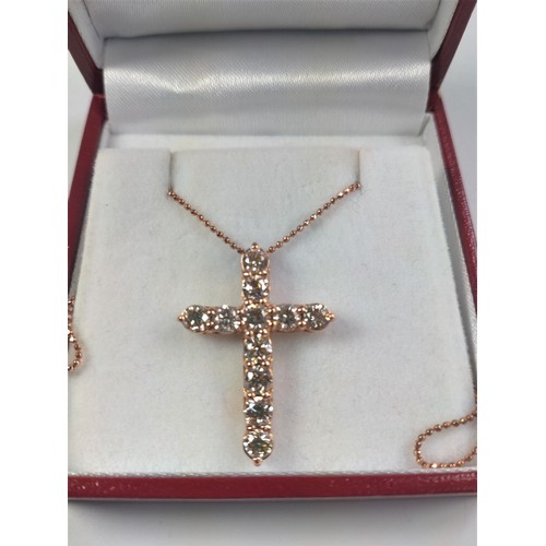 1062 - An 18ct rose gold RBS diamond cross pendant with rose gold dipped silver chain, boxed. Diamnds 2.20c... 